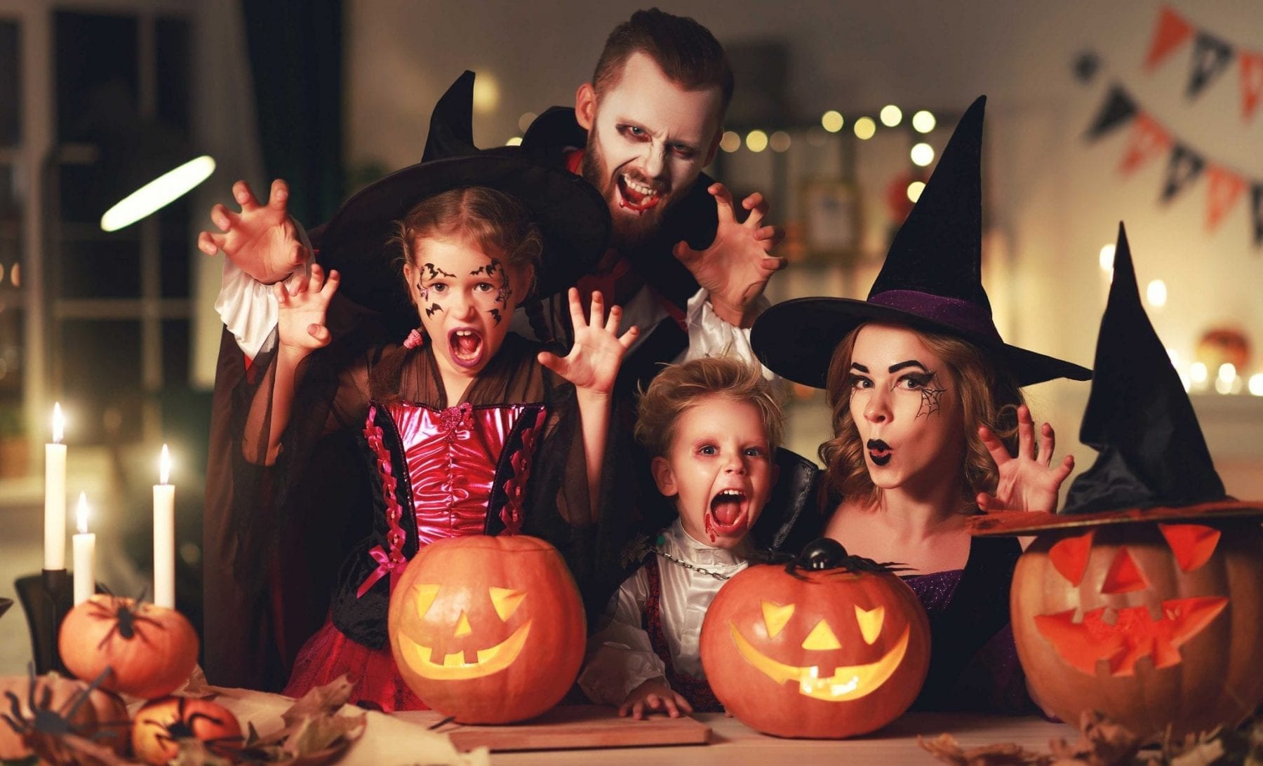 Family dressed as vampires for Halloween